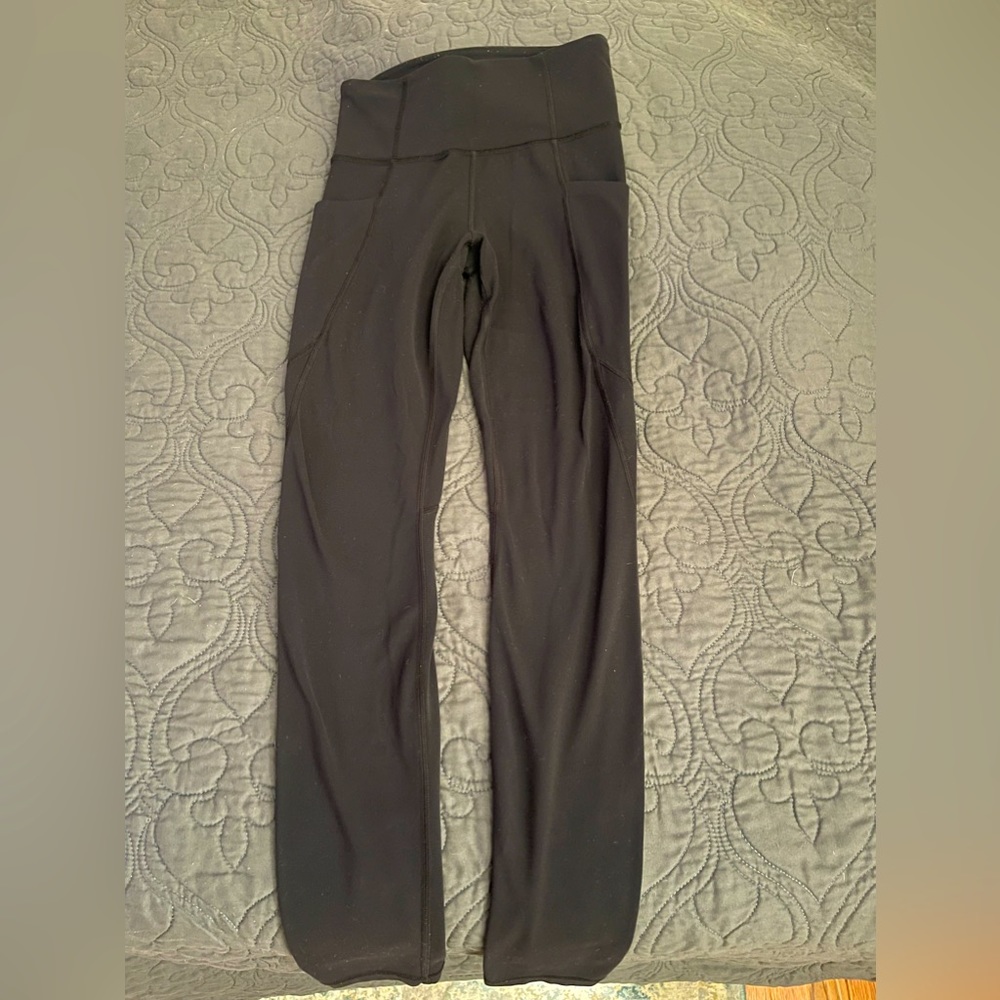 Athleta pocketed salutation leggings
